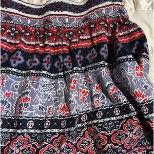 Loft skirt, XS. It is not petite, I am 5 ft and it fits me just to my knees.